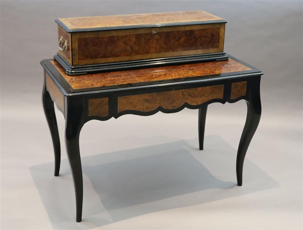A 19th century Swiss Nicole Freres table musical box, width 44in. depth 24in. height overall 39in.